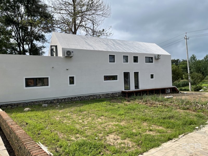 初家村里经过改造的民居（央广网记者 黄玉玲 摄）